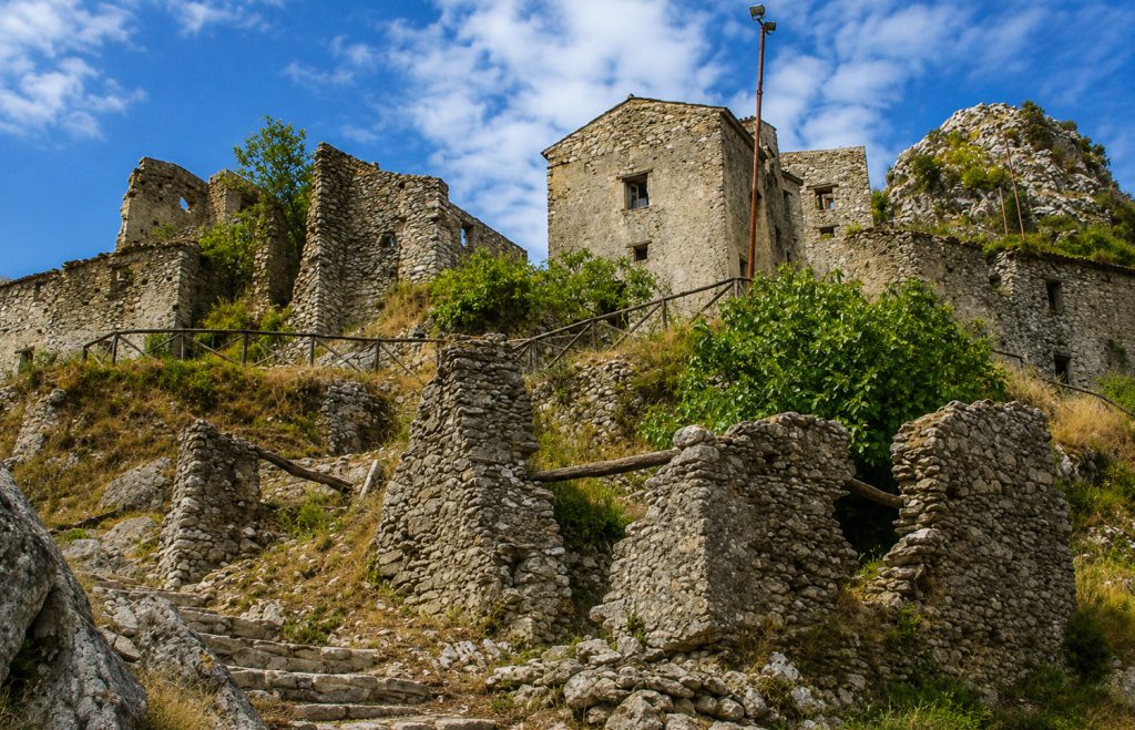 View of the Ancient Village of San Severino di Centola, with its old stone houses and medieval castle in Cilento.